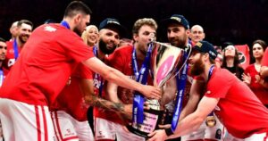 Papanikolaou-Fournier-Vezenkov-Milutinov-Walkup-Olympiacos-GBL-Champions-2026-trophy